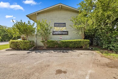 Community sign with uncovered parking