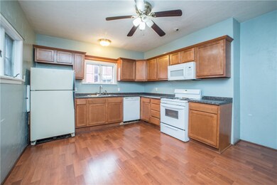 Eat-in kitchen accommodates large table.