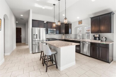 Kitchen featuring appliances with stainless steel