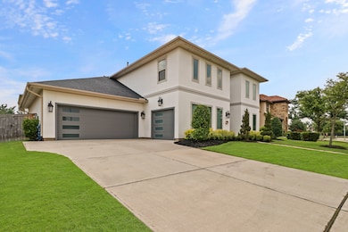 This magnificent home features a 3 Car Garage for