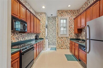 Large kitchen includes washer/dryer