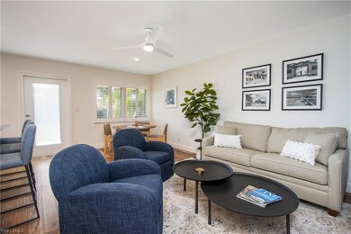 Dining space with wood finished floors and baseboards