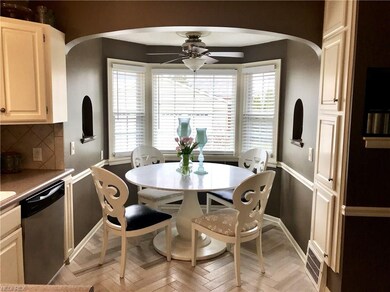 Spacious breakfast nook in kitchen with bay window