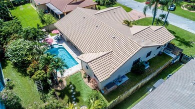 Nicely landscaped front and back.