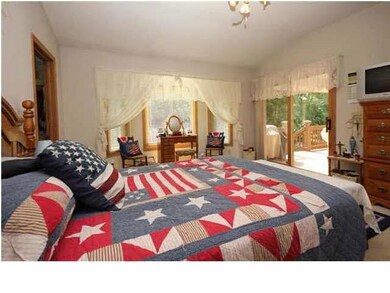 Another view of masterbedroom with deck off the ma