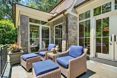 A series of Bluestone patios provide multiple areas to relax or entertain overlooking the natural surroundings.