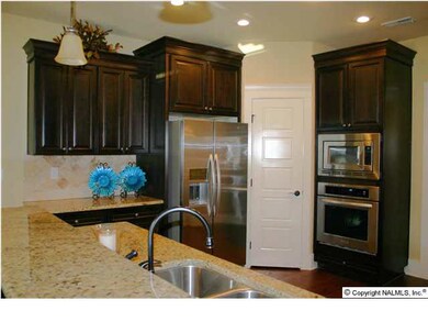 Full Overlay Stacked Cabinets w/ heavy Crown, Soft close hinges, Dovetail soft close drawers, SS Kitchen Aid Appliances, Granite, 5