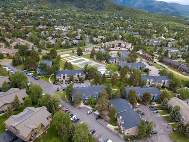 Aerial perspective of suburban area with a mountai