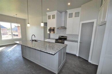 Kitchen  Beautiful trendy backsplash, stainless ap