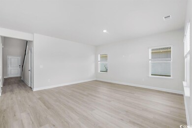 Unfurnished room with recessed lighting, visible v