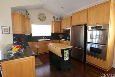 Chef's Kitchen With Custom Cabinetry