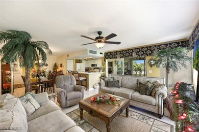 Living area featuring light tile patterned floorin