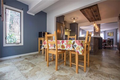 Dining room leading to the kitchen.