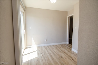 Loft/hallway with the slider to the backyard