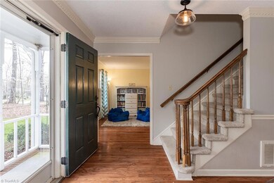 Foyer also leads to the formal living room.