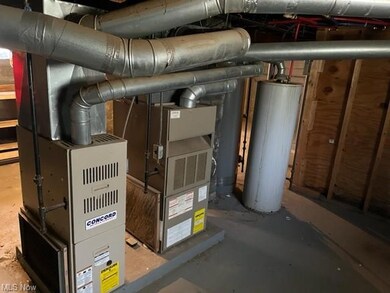 Utility room featuring heating utilities and gas w