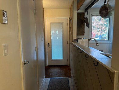 Entry way with mud room and half bath