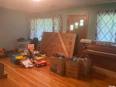 Living Room -gleaming hardwood flooring