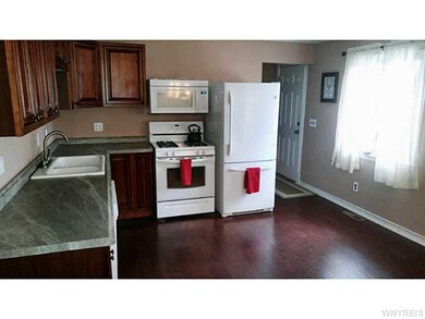 Kitchen. New counter top, cupboards, dishwasher, a