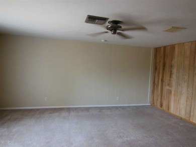 Bonus Room has  Wood Paneling