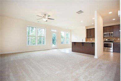 Unfurnished living room with light carpet, light tile patterned floors, recessed lighting, and ceiling fan