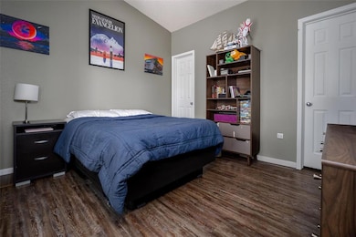 One of four bedrooms, with walk-in closet and private bathroom.
