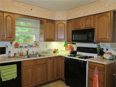Enjoy meal prep in this newer kitchen.  Gas stove,
