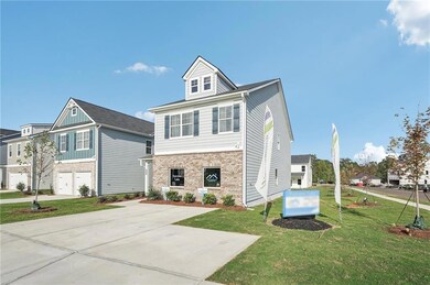 View of front of property with a garage and a fron