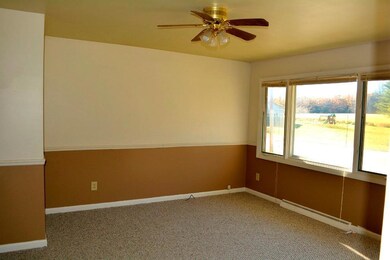 Bright, sunny living room with new...