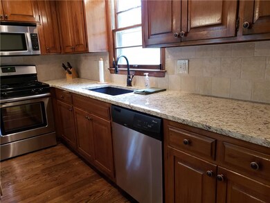 Stainless appliances, granite sink and counters. N