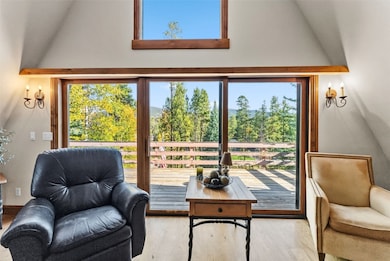 Sitting room with wood finished floors