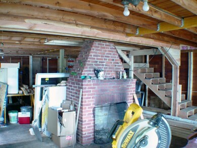 The Central Fireplace In The Living...