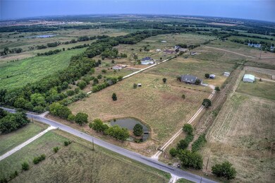 iView of full 10 acres and surrounding land