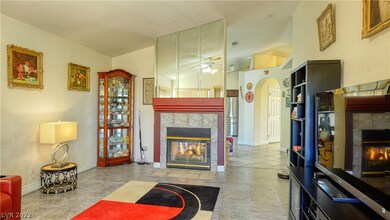 Two-way gas fireplace between family and dining ro