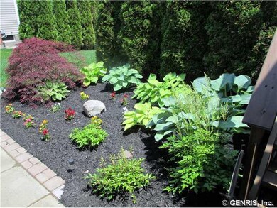 Yard Professionally landscaped around entire home 