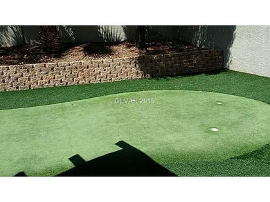 Exterior Back. putting green