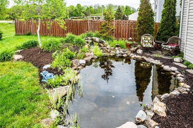 12x18 koi pond with waterfall and lights provides peaceful setting! 