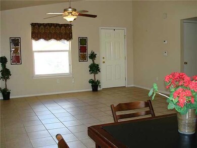 Living room and front door view from Din