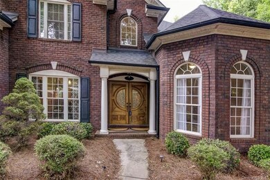 Welcome home! Full brick home on private wooded lo