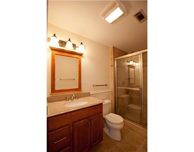 Bathroom. To the left of the laundry area is the n