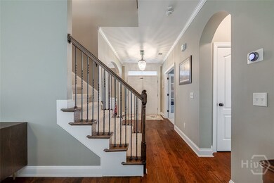 Beautiful staircase between the dining room and th