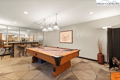 Main level billiard and bar area