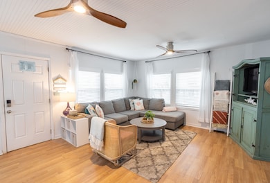 This cozy living room features a light, airy desig