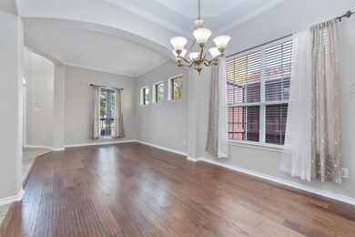 Gorgeous wood floors and tray ceiling