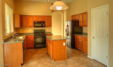 CHEFS KITCHEN WITH NEW REFRIGERATOR