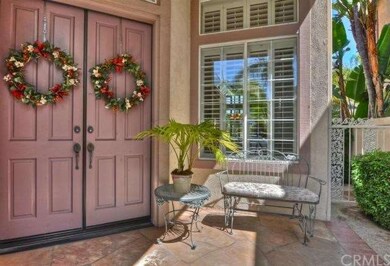 Sunny front patio with large French doors.