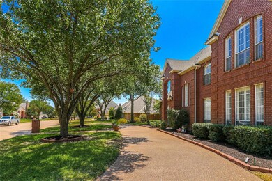 Circular drive and some awesome shade trees!