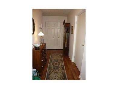 Entry/Foyer. The welcoming entry has wood floors; 