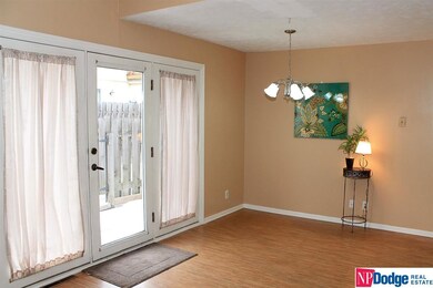 GREAT DINING ROOM, ATRIUM DOOR LEADS TO A PRIVATE FENCED PATIO. UNLOADING YOUR GROCERIES RIGHT INTO YOUR DINING ROOM FROM THE PATIO ENTRANCE IS A BREEZE!