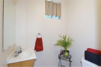 Half bath located off of the family room.